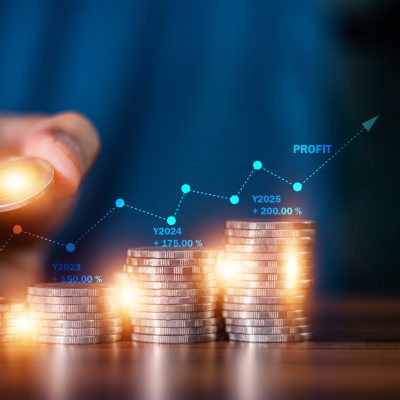 Hand counting coins stack for background business investment investor and stock market concept